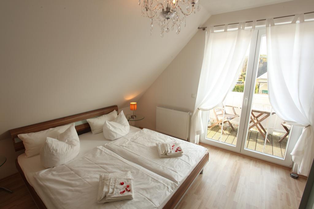 Aparthotel Haus Amo Solem Dierhagen Habitación foto